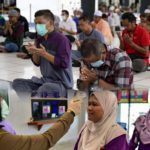 Malaysians brace for economic and social impacts of lockdown