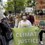 Activists stage global climate protest, slam Ukraine war.