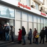 Russian stock market, crushed by war, will partially reopen