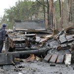 Ukrainian forces retake areas near Kyiv amid fear of traps.